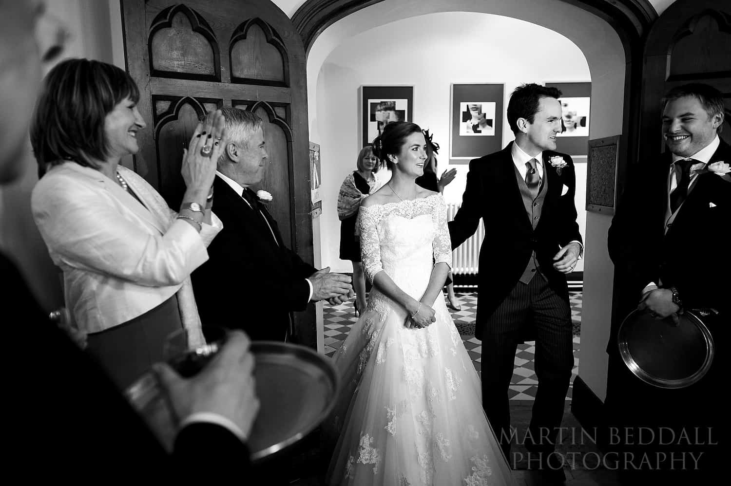 Bride and groom announced into dinner