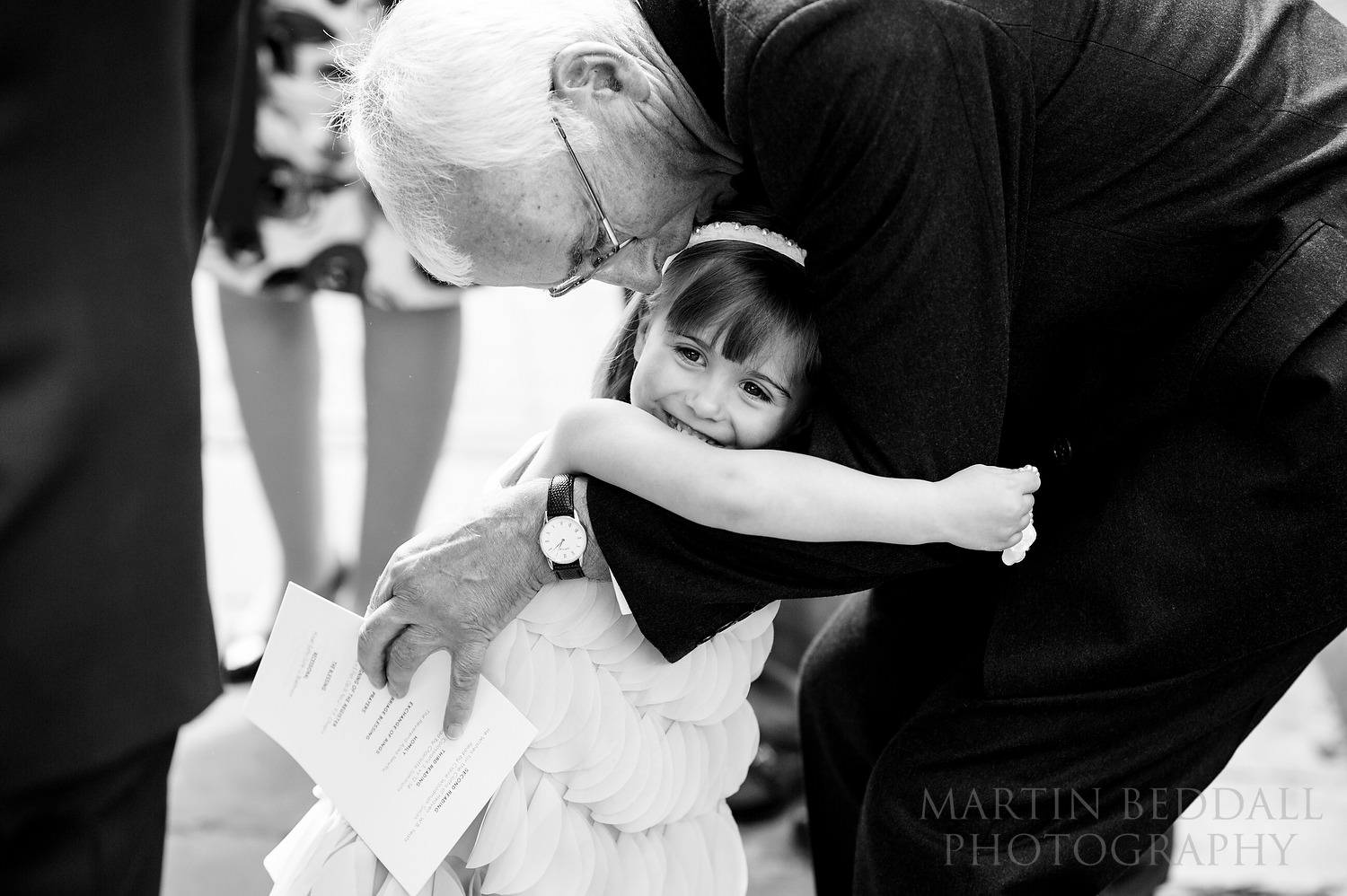Generations greet outside the church