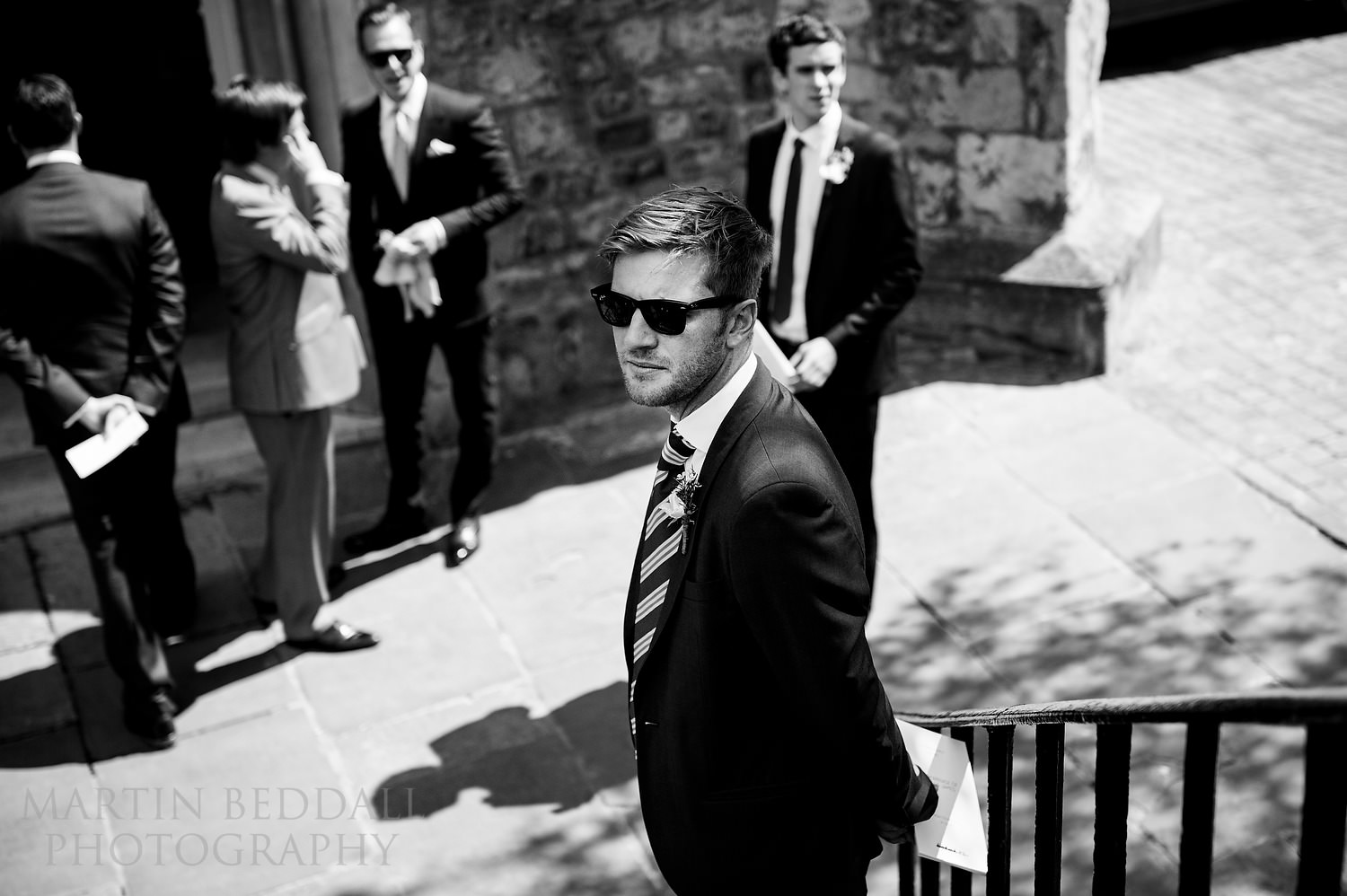 Ushers outside the church