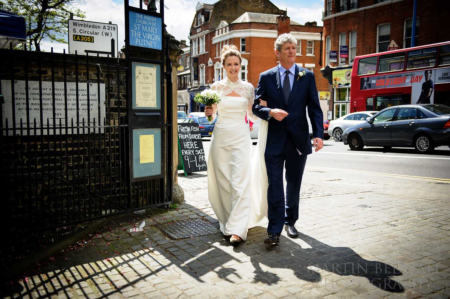 Bride and herfather arrive at St Mary the Virgin church in Putney
