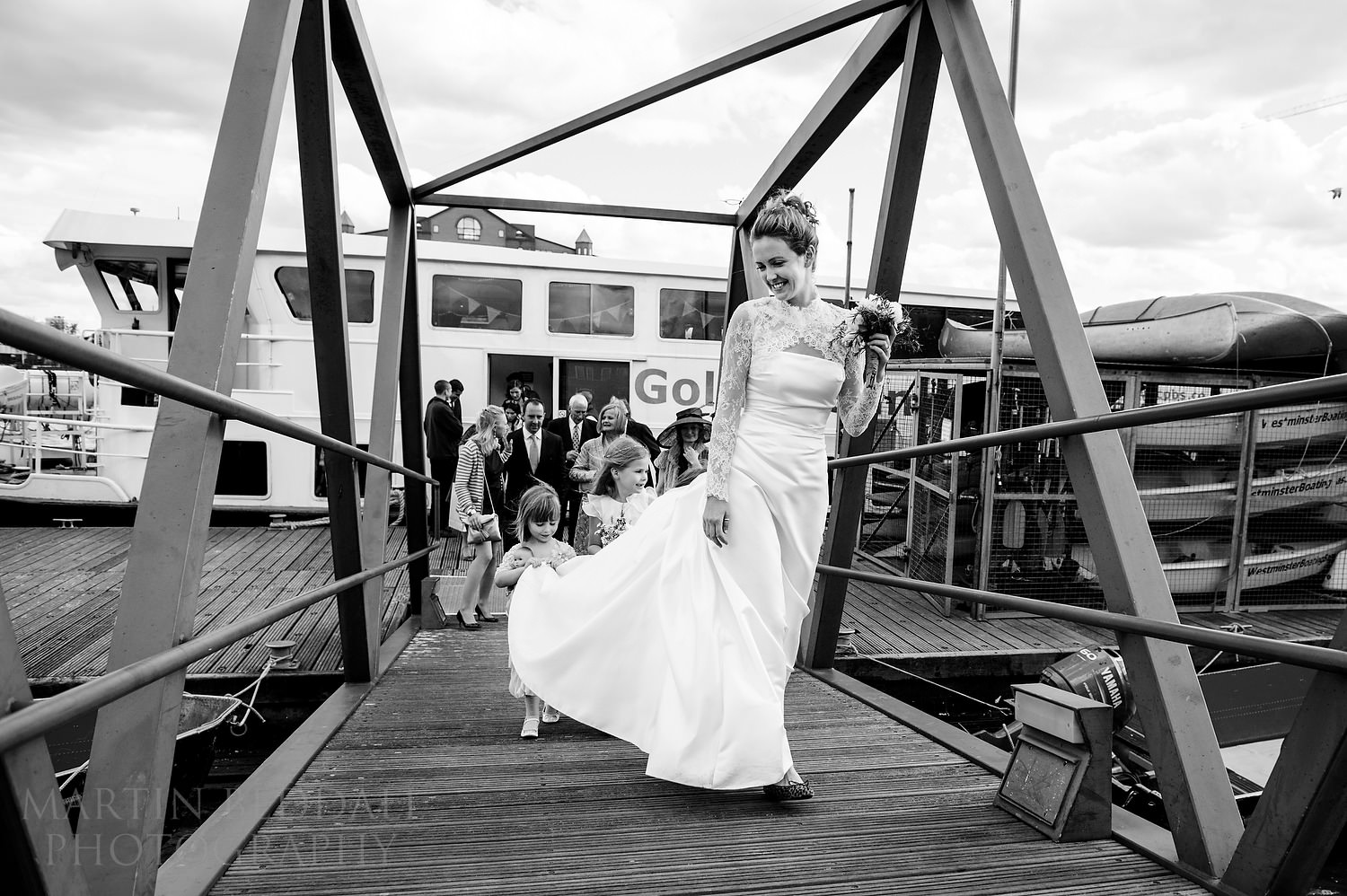 Helping the bride with her dress