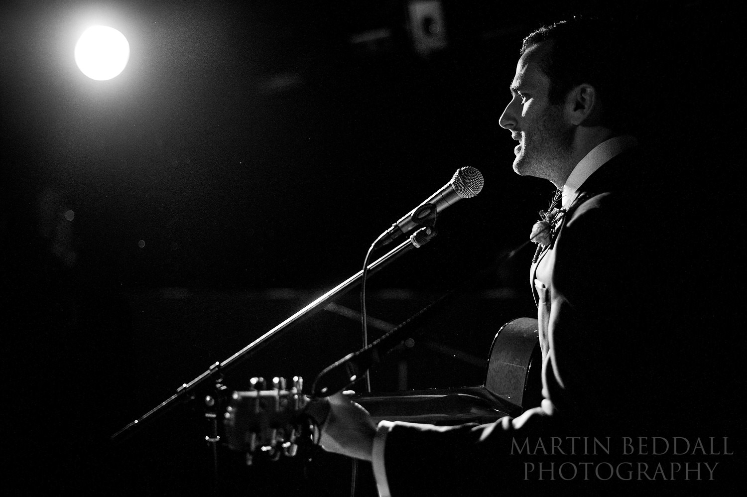 Groom sings for the bride
