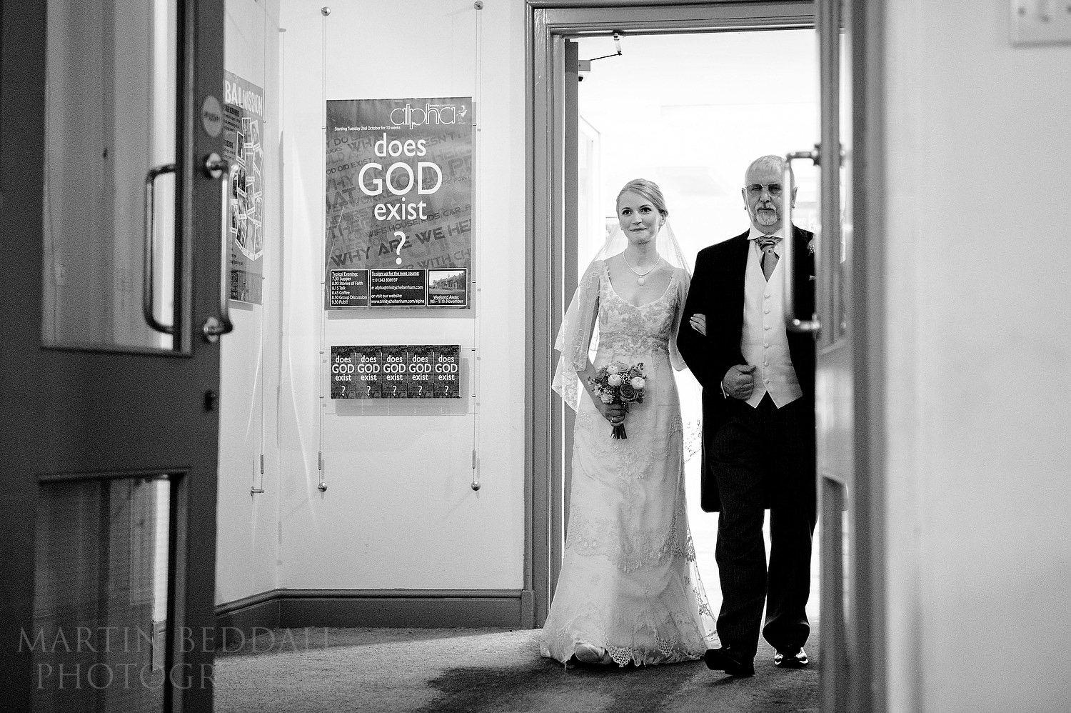 Bride walks into church with her father