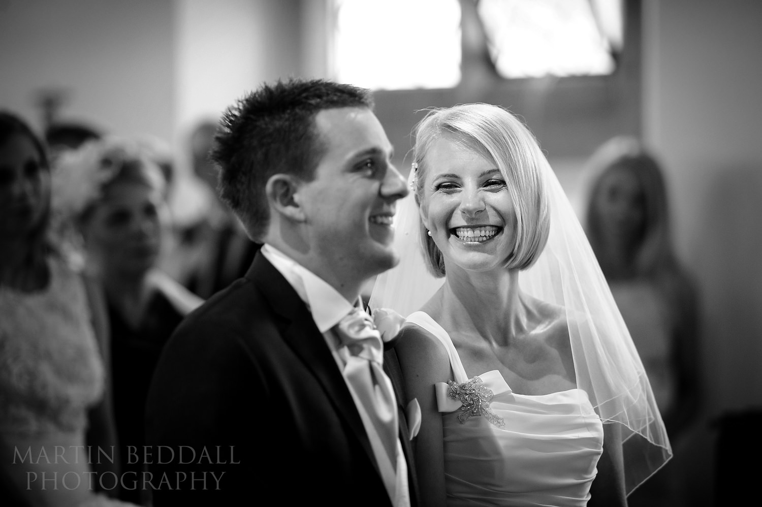 Smiling bride and groom