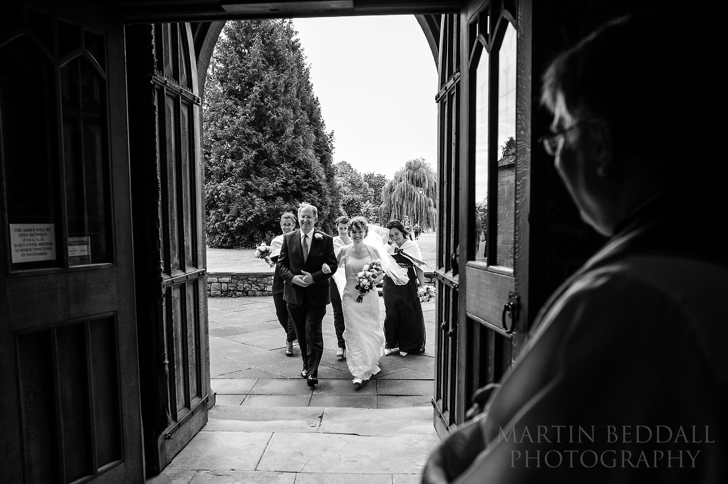 Bride and her father enter Pershore Abbey