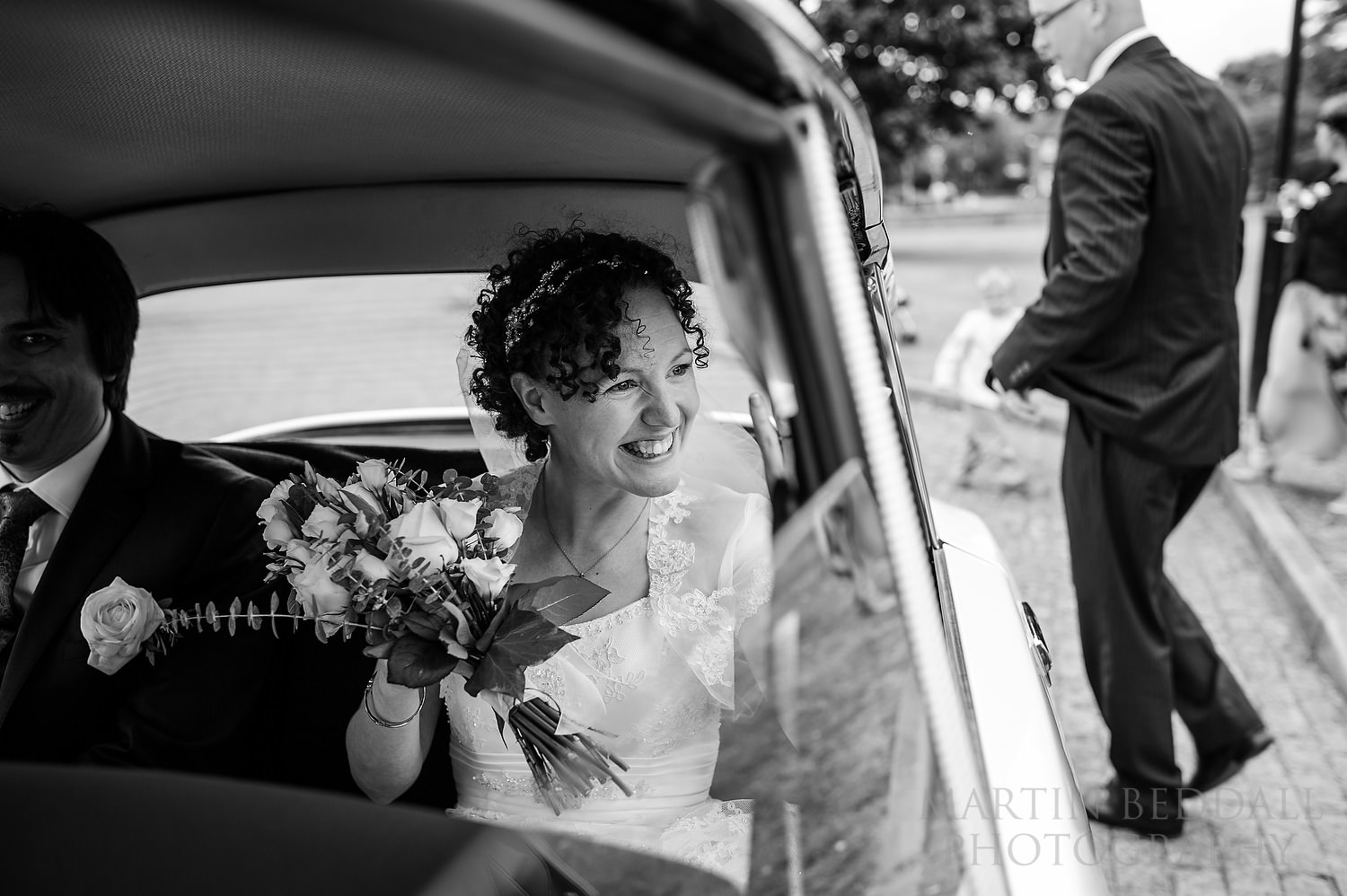 Bride in the French wedding car