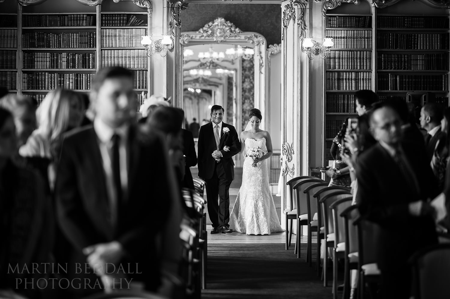 Bride and her father enter the ceremony room at Wrest Park