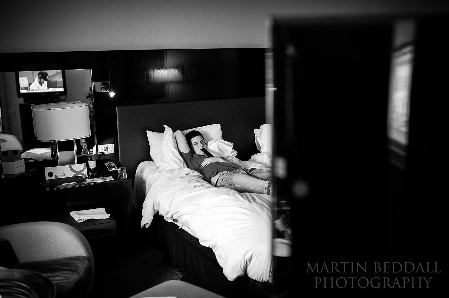 Watching the cricket on TV on wedding morning