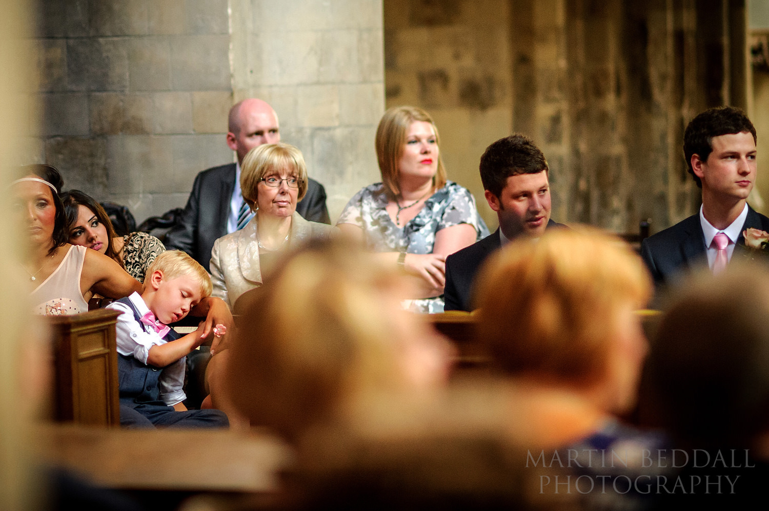 Young wedding guest asleep at Smithfield wedding