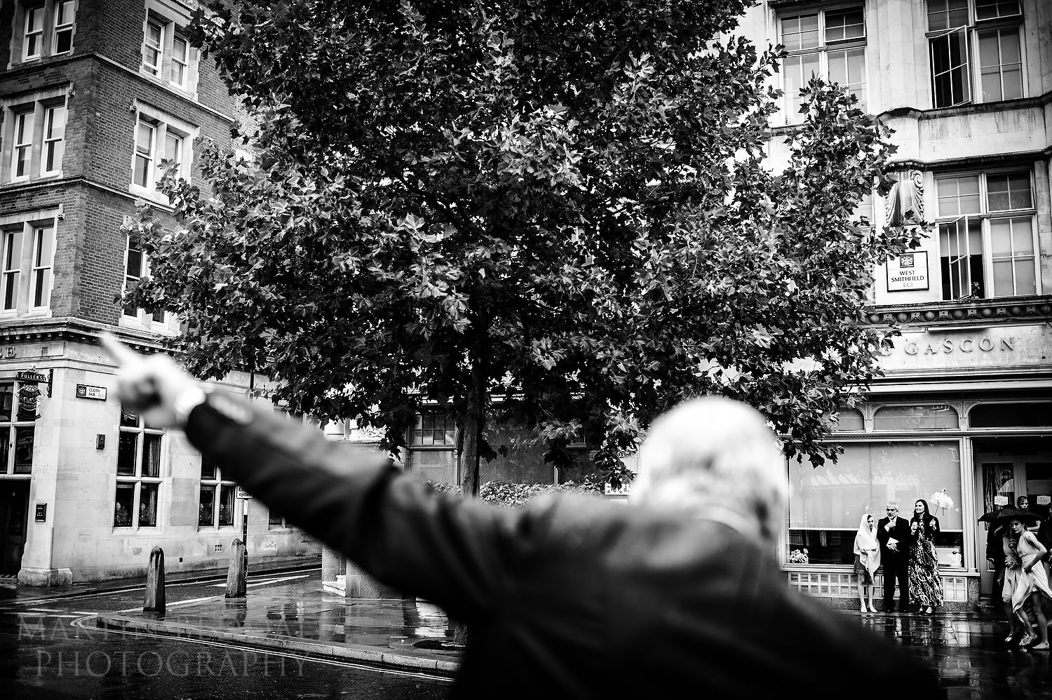 Pointing out the way to the wedding buses
