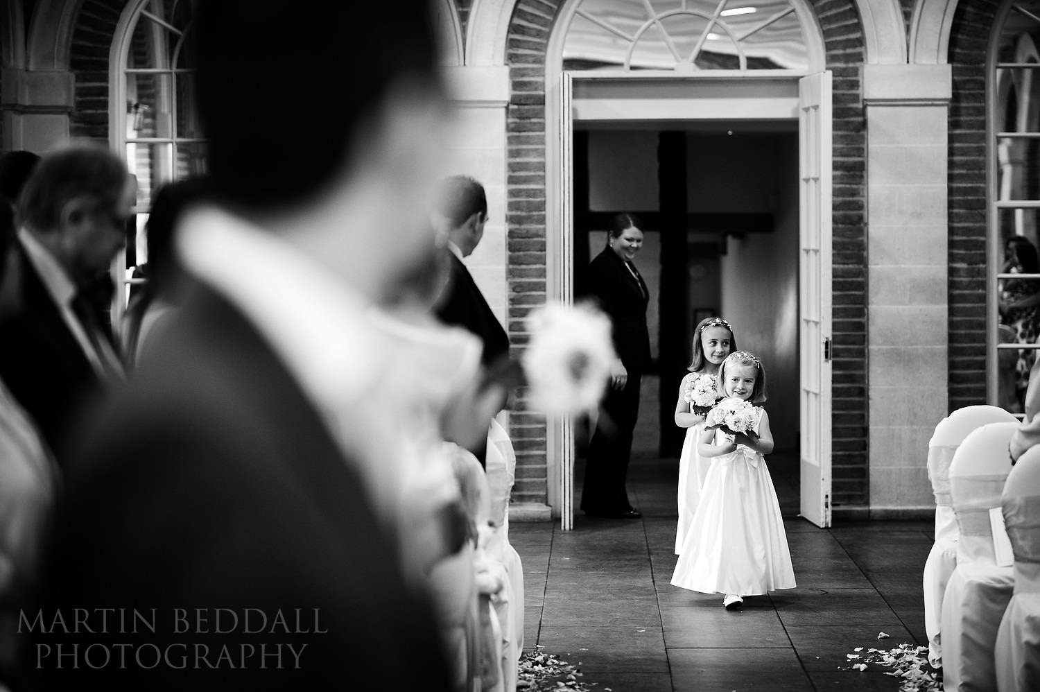 Flower girls start the ceremony at Great Fosters