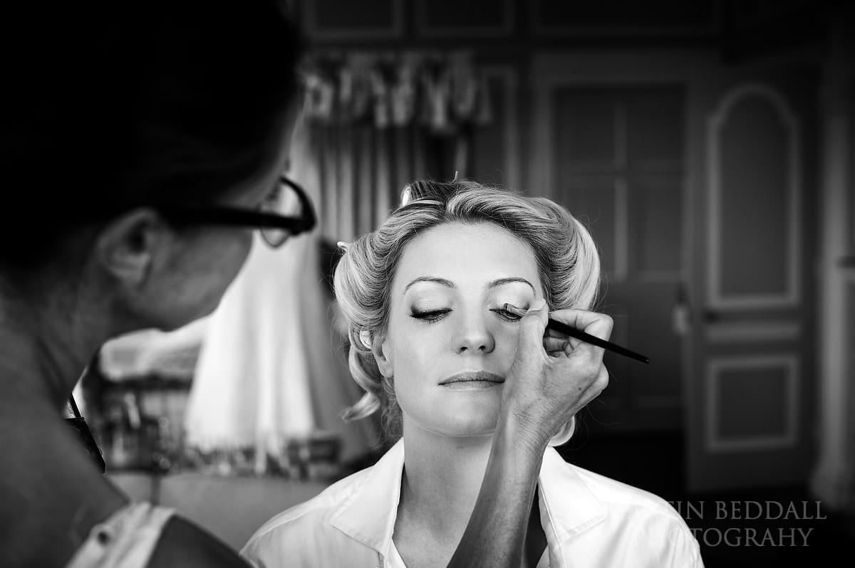 Bride getting her makeup done