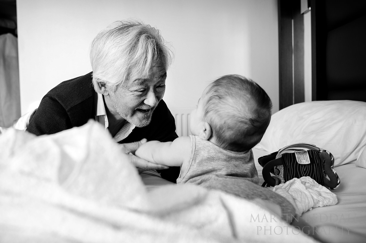 Playing with his grandfather