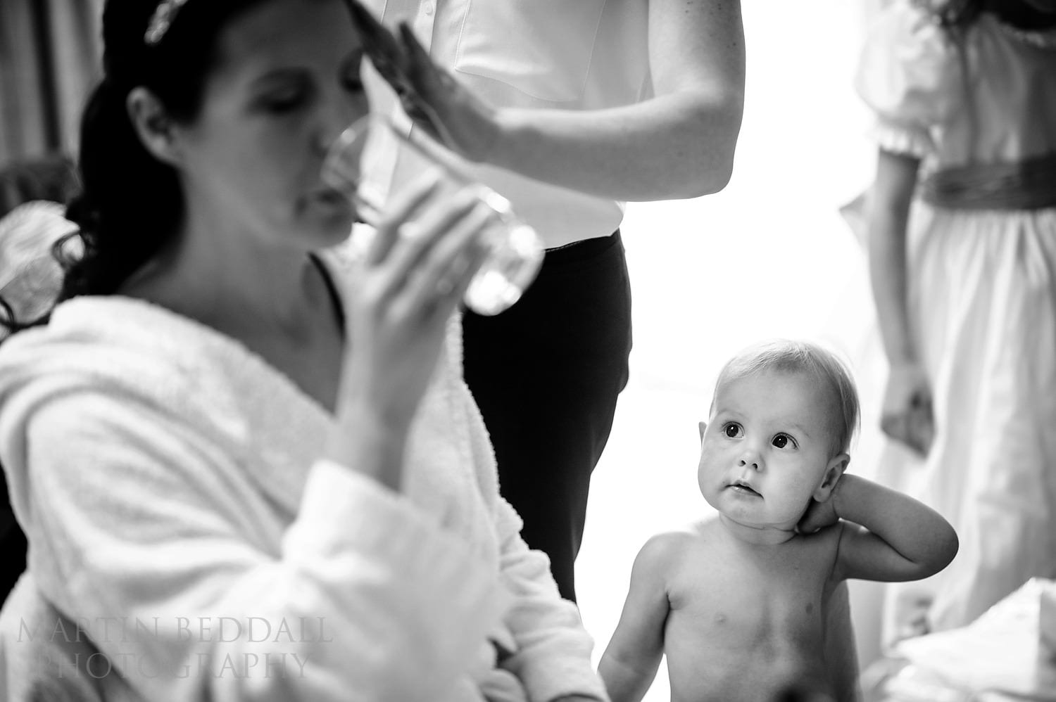 Daughter watches her mother get ready