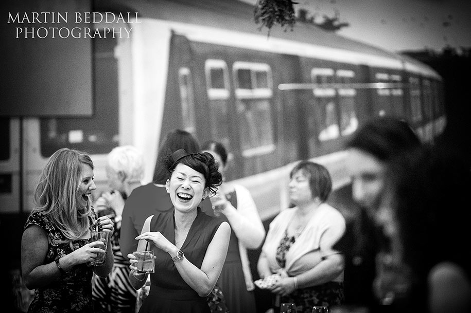 wedding reception at 6 St Chad's Place in London Laughing wedding guests during the recption