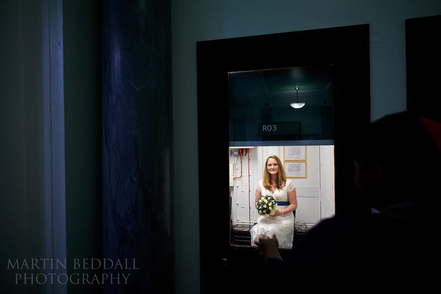 Bride waits for her interview with the registrars