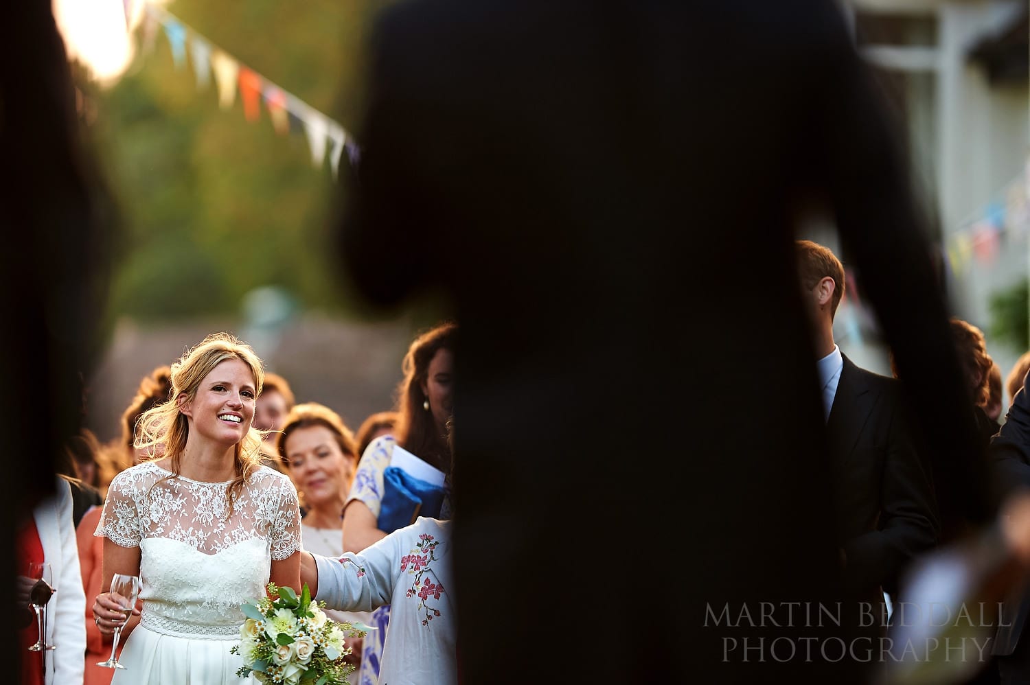 Bride listens to groom's wedding speech