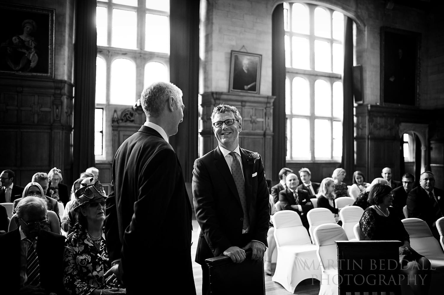 Groom waits in the ceremony room at Oxford Town Hall