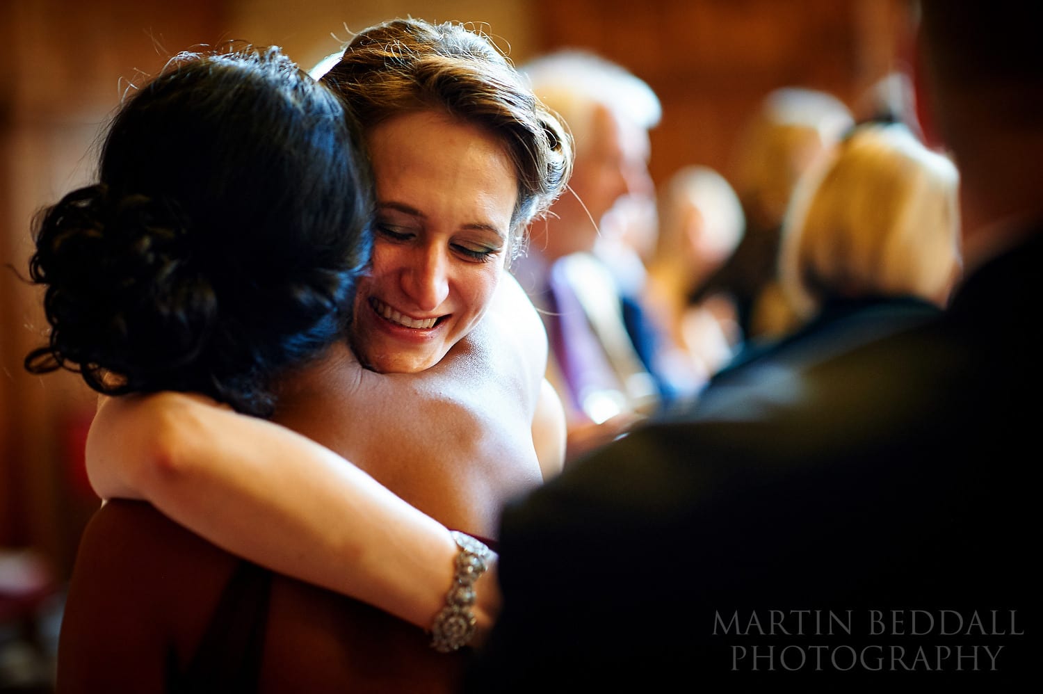 Bride hugging a friend