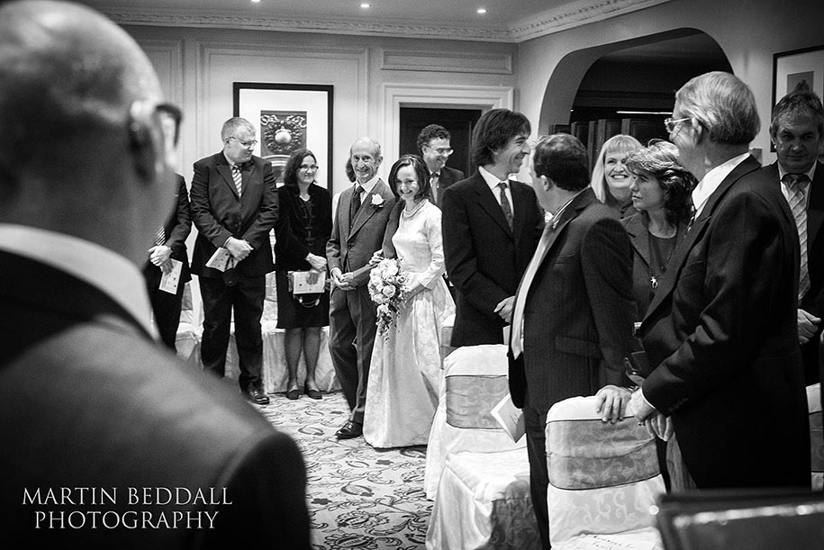 Bride walks down the aisle with her father
