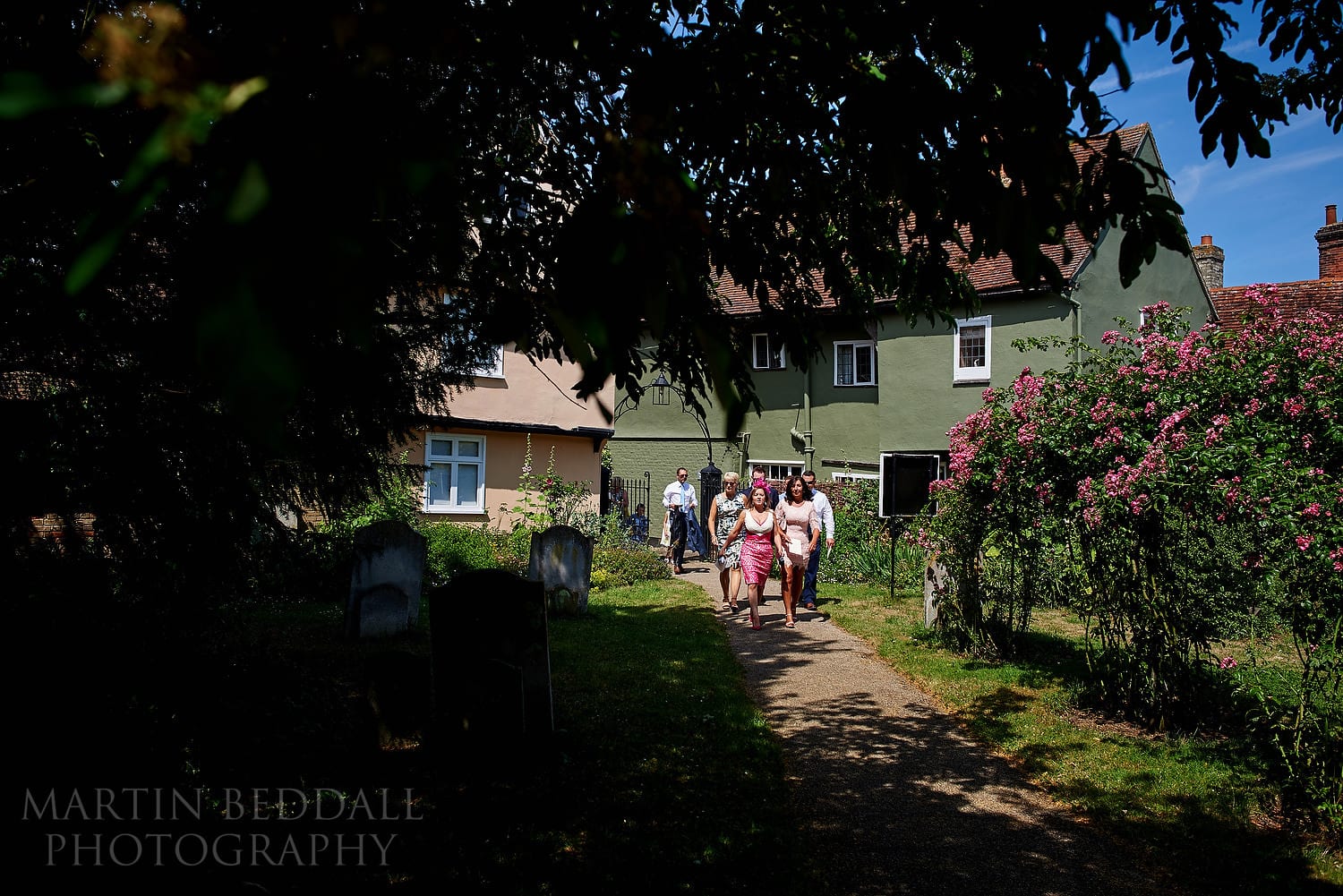 Guests walk to the church
