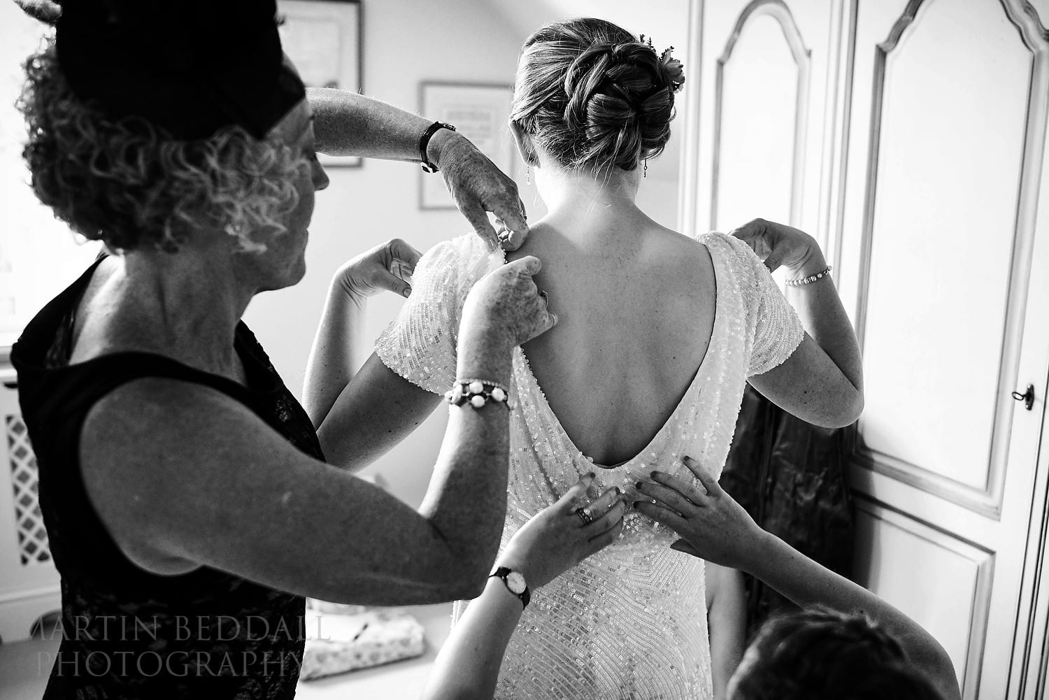 Getting the wedding dress on