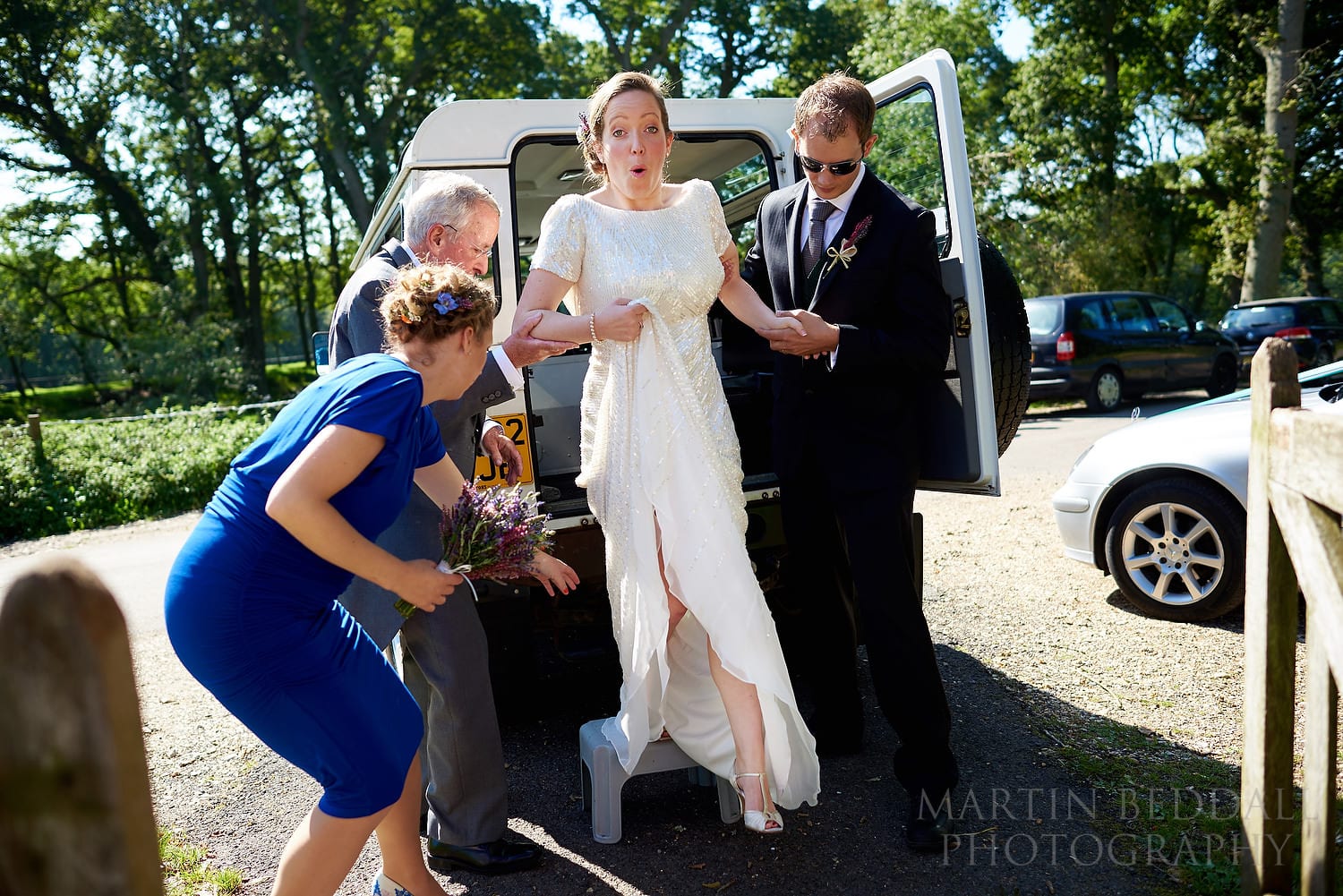 Bride arrives by Landrover