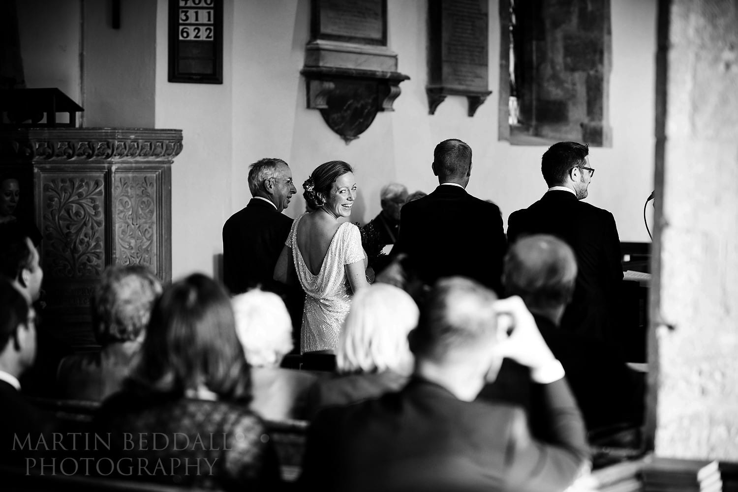 Laughing with wedding guests