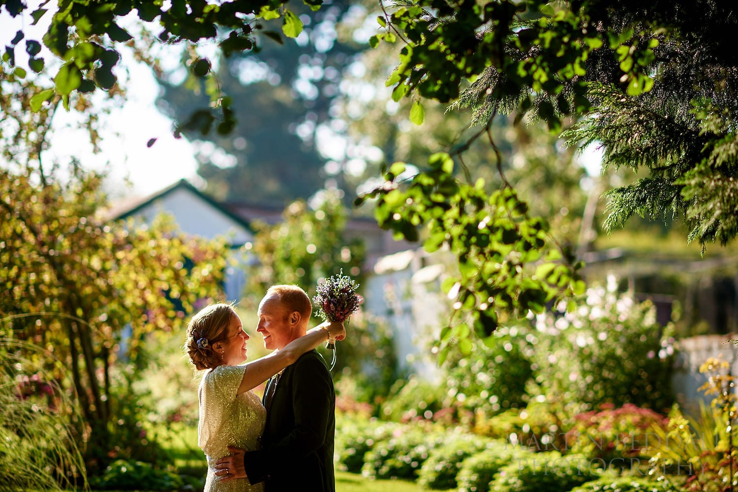 Sunny September wedding bride and groom portrait