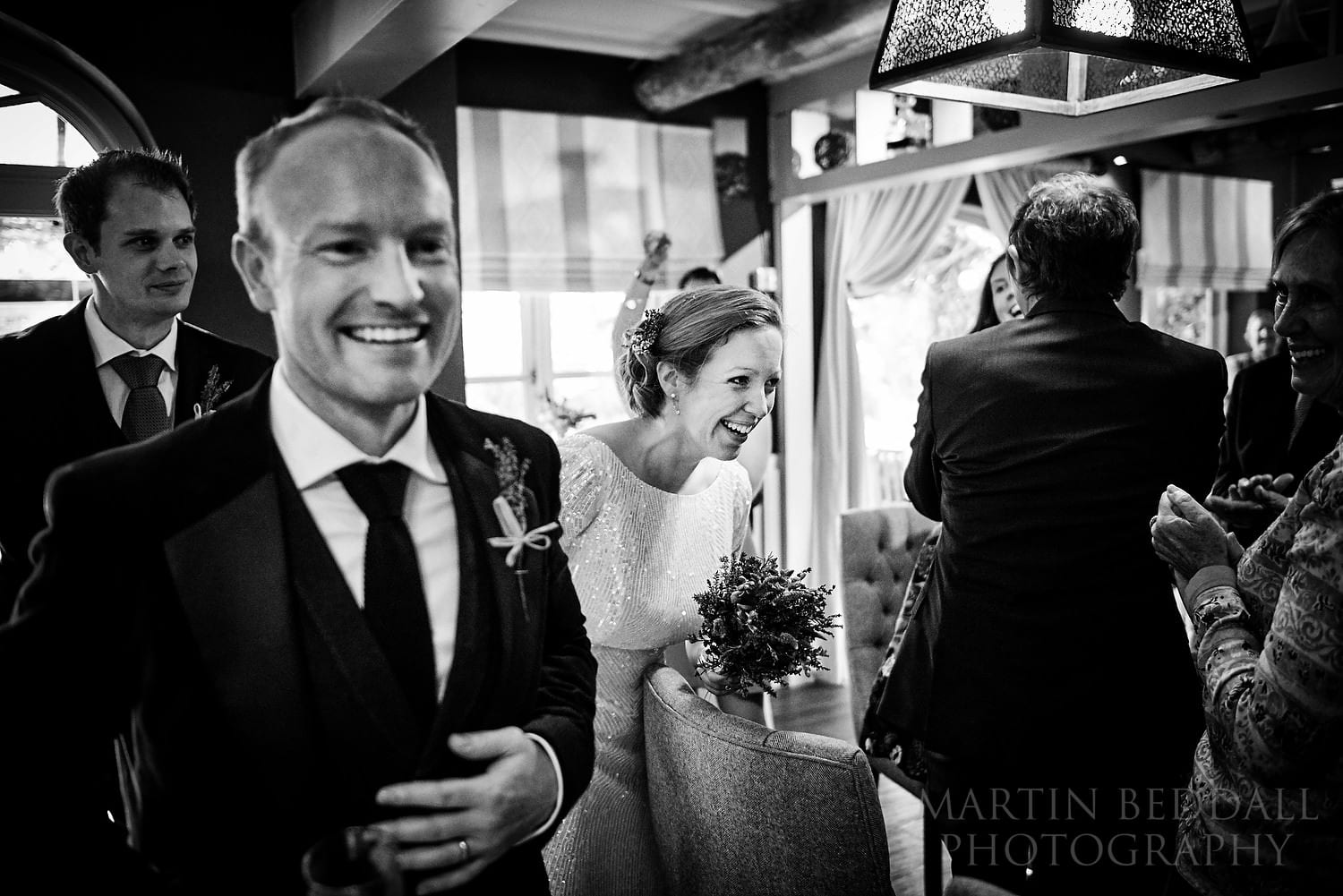 Bride and groom enter for the wedding dinner