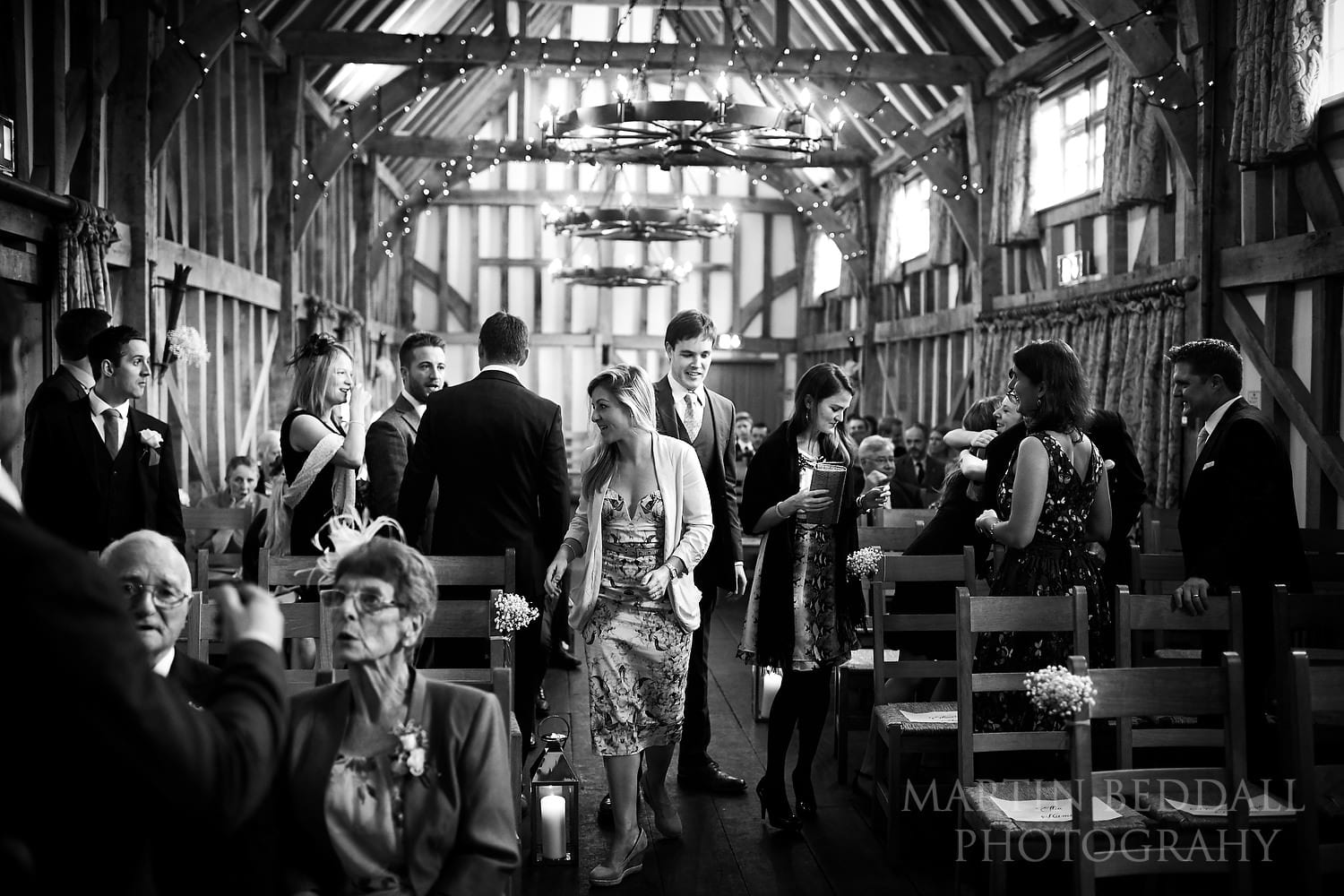 Guests take their seats for cthe ceremony at Gate St Barn