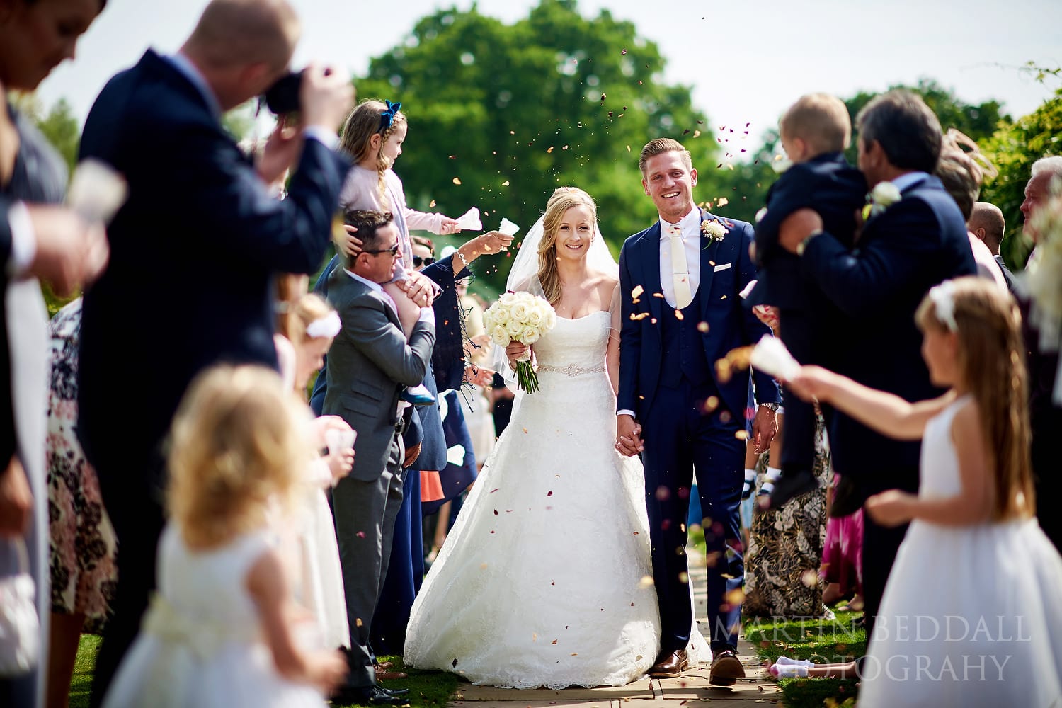Confetti run at Braxted Park wedding
