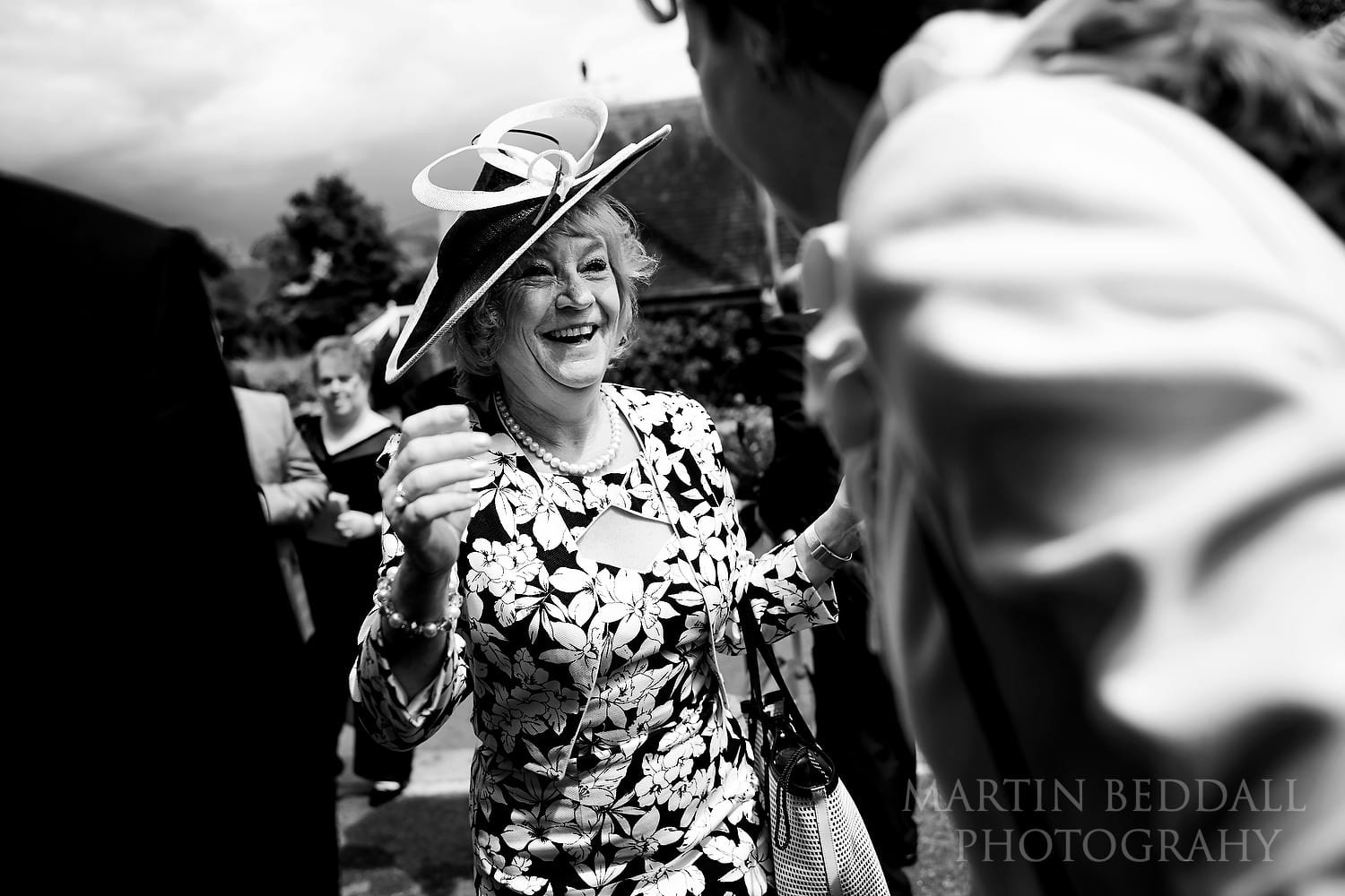 Wedding guest greetings outside Fontmell Magna church