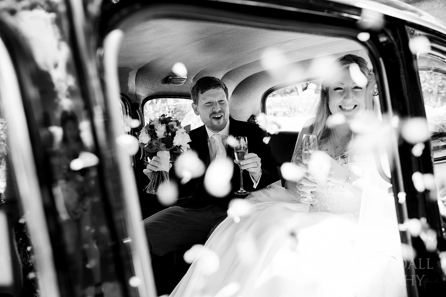 Confetti around the wedding car