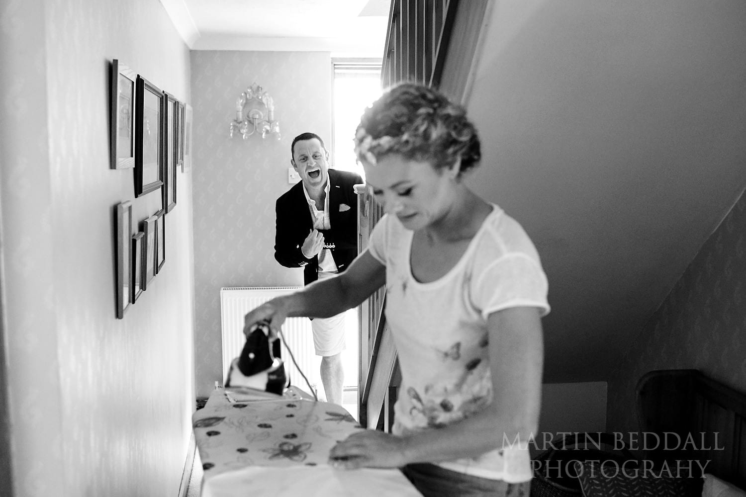 Bride doing last minute ironing