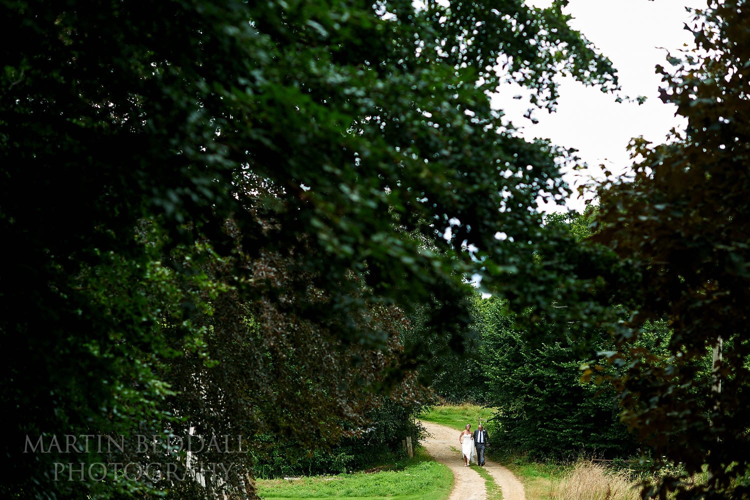 Bride and her father in the grounds of Chafford Park 