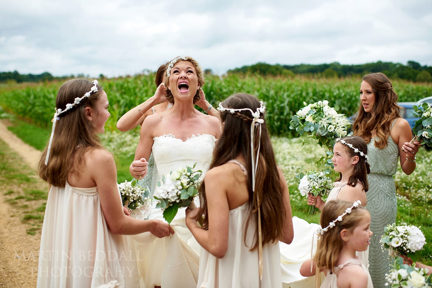 Fixing the bride's veil on