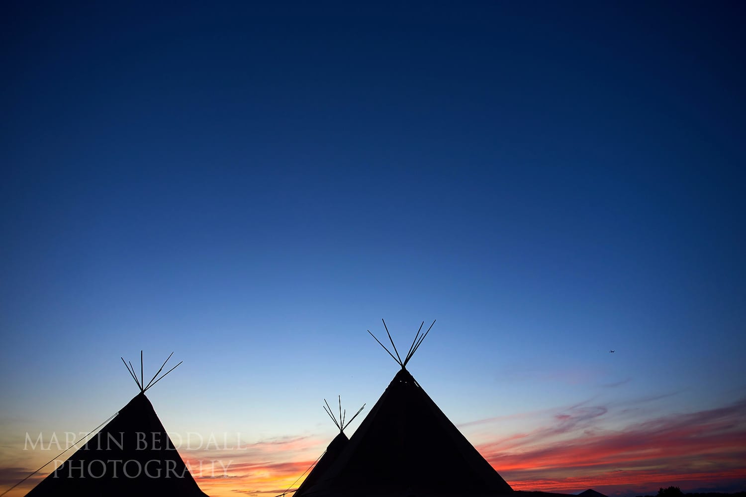 Tipis on a summer evening at Chafford Park wedding