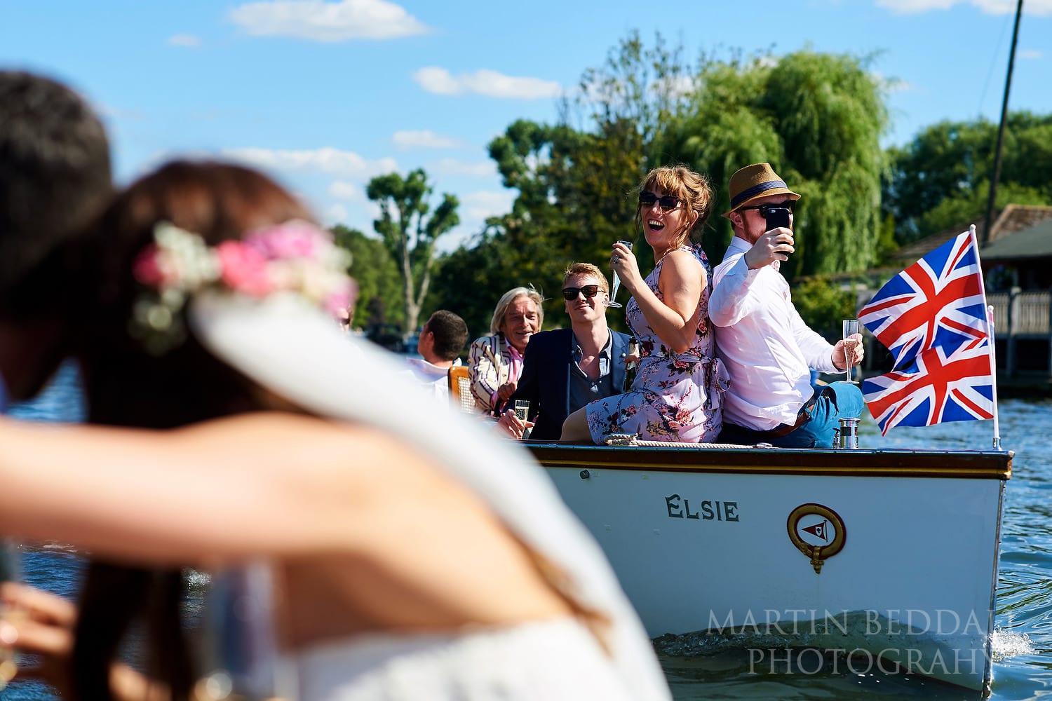Wedding guests on boats on the Thames