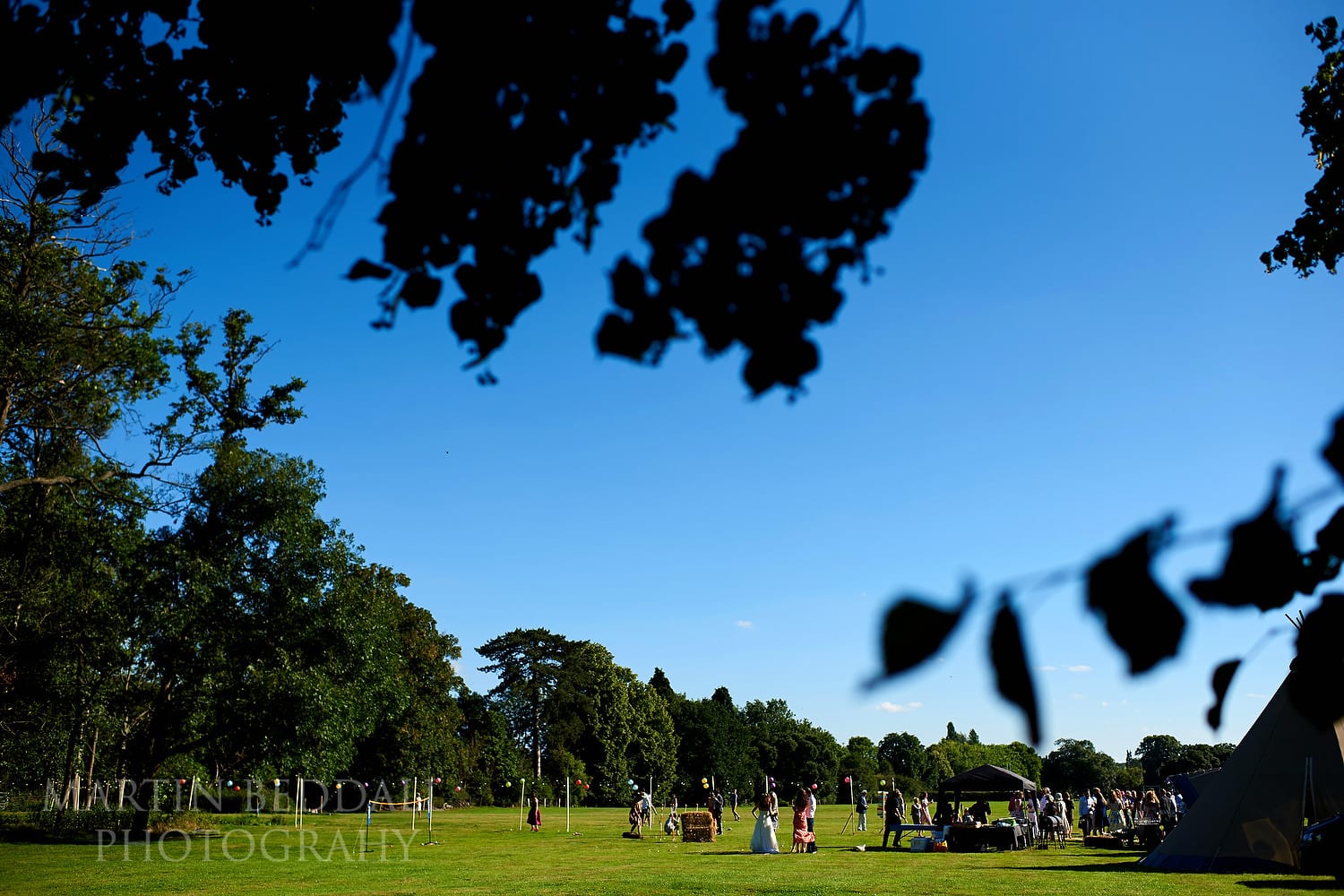 Festival style wedding in the riverside meadow