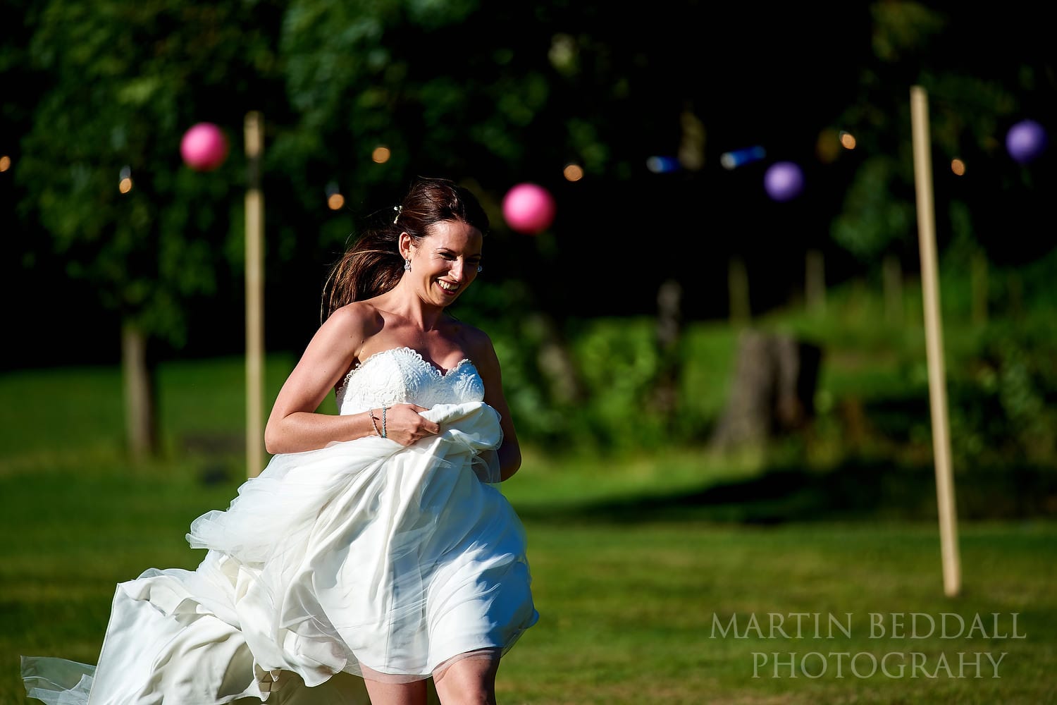 Bride plays cricket at Festival style wedding