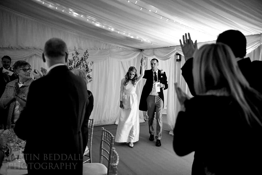 bride and groom entrance to the meal