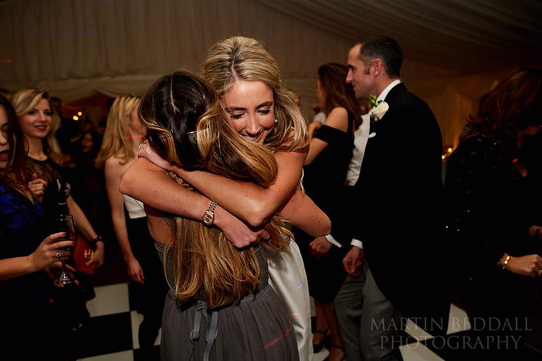 bride hugs her best friend