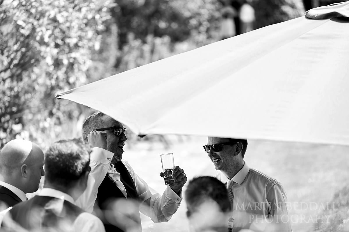 Guests gather in the sunshine at Horsted Place