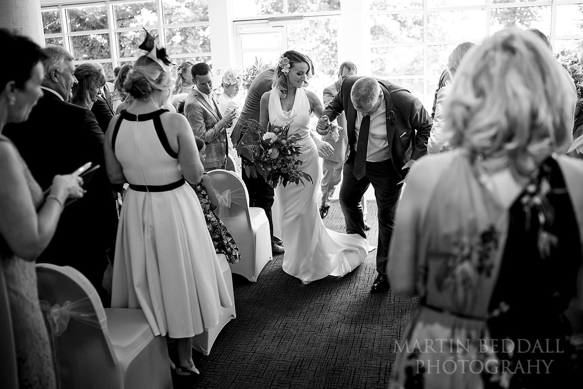 Stepping on the bride's dress