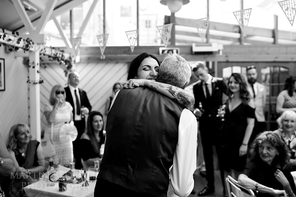 Portsmouth bride hugs her father aftee his speech