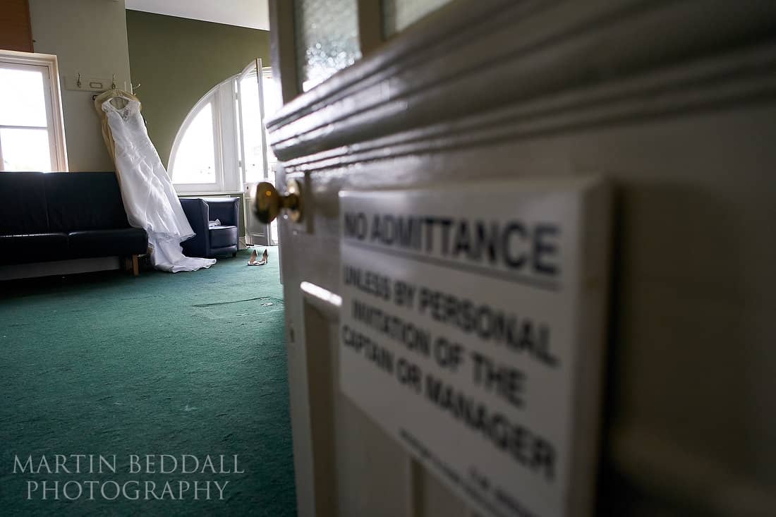 Wedding dress hanging in the England dressing room at Lord's