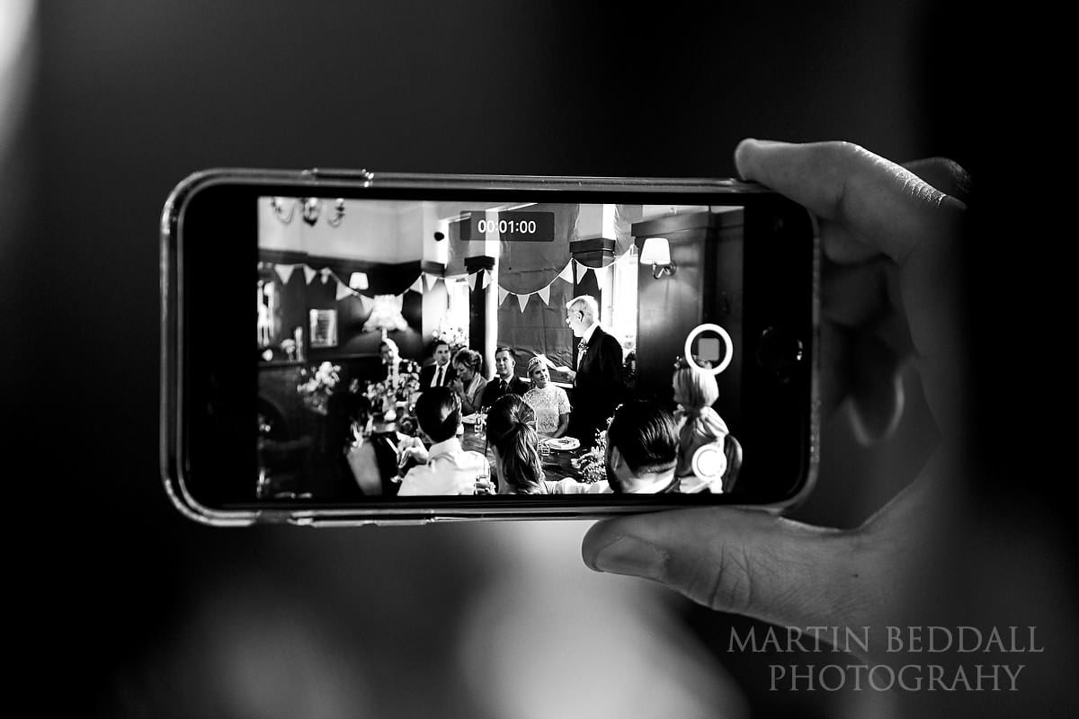 Filming the speeches at The Duke pub wedding