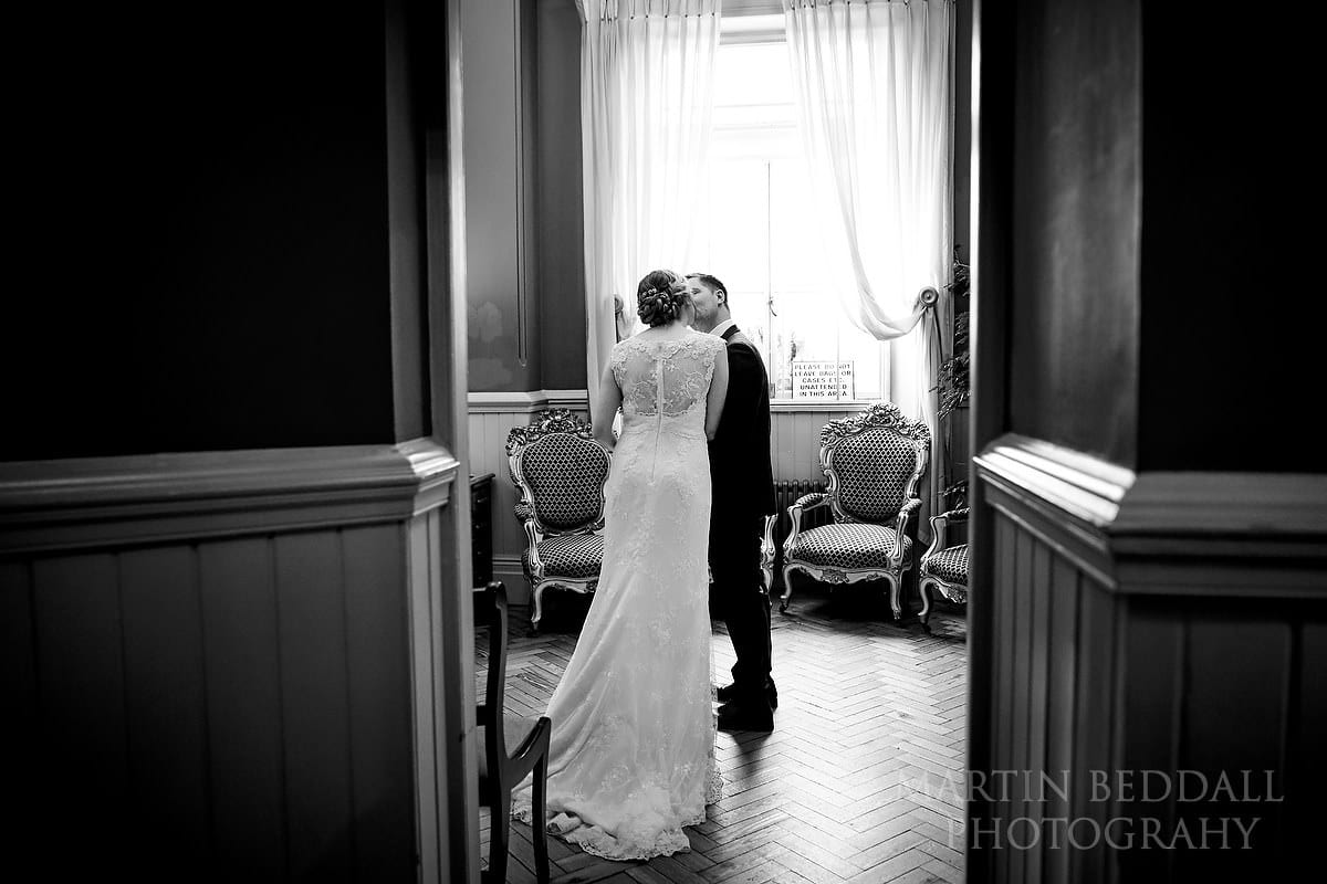 Bride and groom kiss after wedding ceremony at Brighton Town Hall 