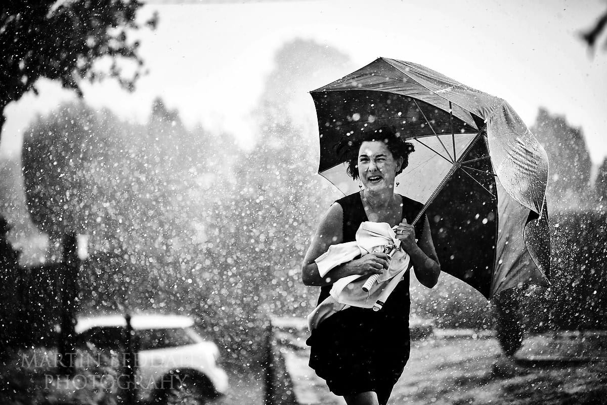 Heavy summer rain before the wedding ceremony